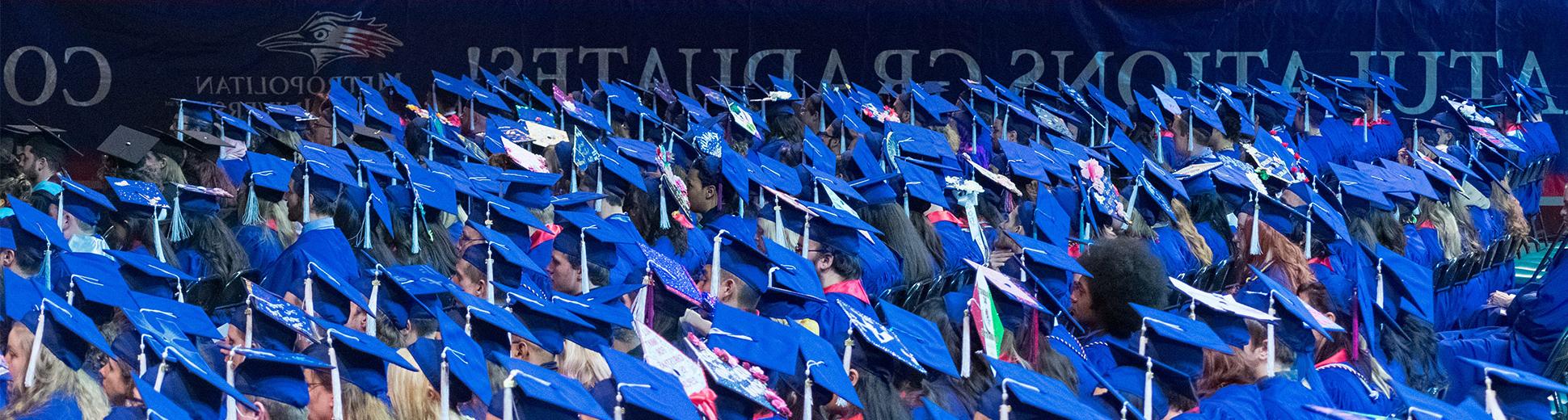 Students in graduation caps at commencement