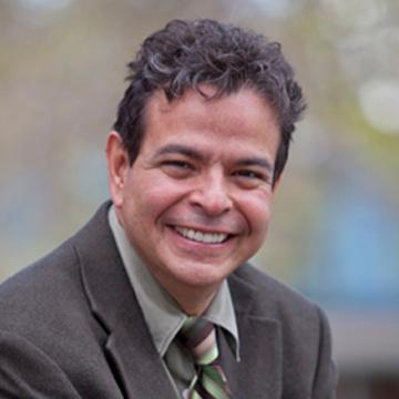 Headshot photo of Dr. Peter Vigil