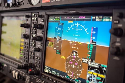 A flight deck with Garmin 1000 avionics.