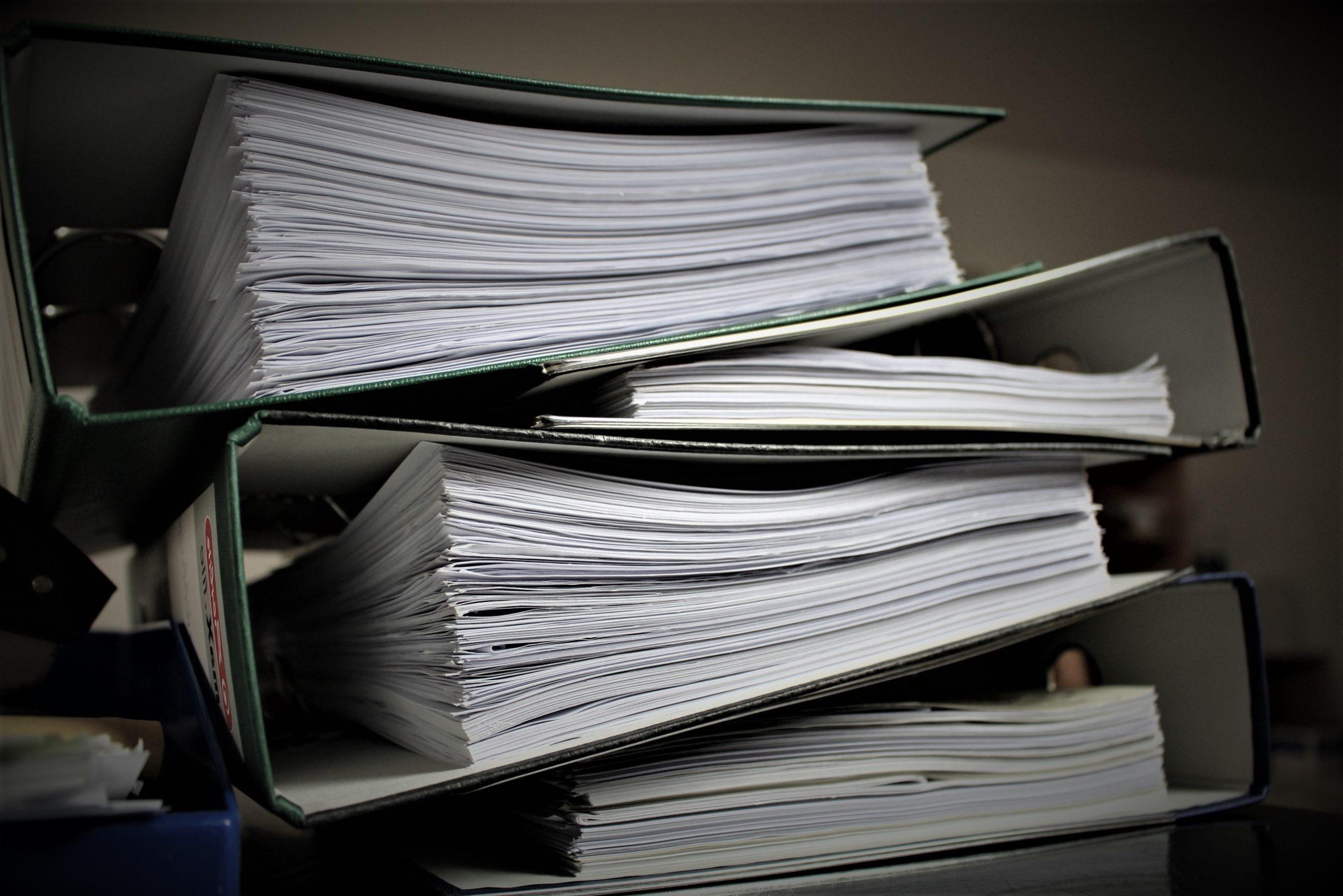 A binder containing several organized files