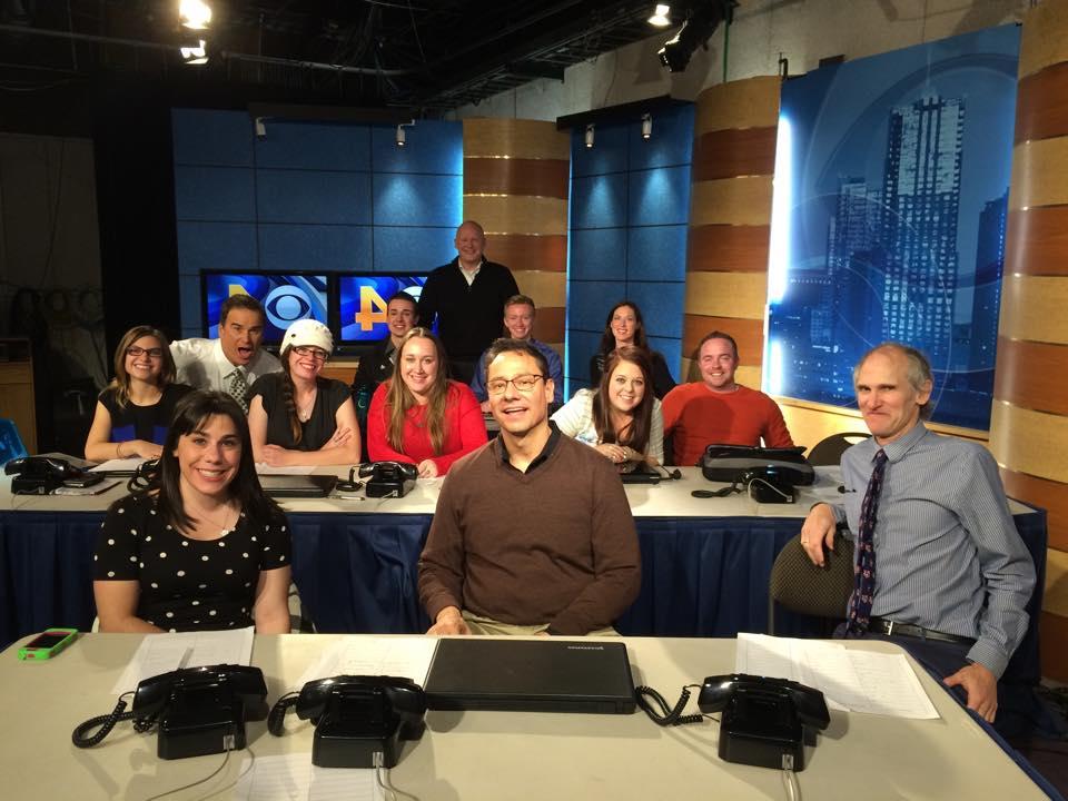 Students and professor at a TV station