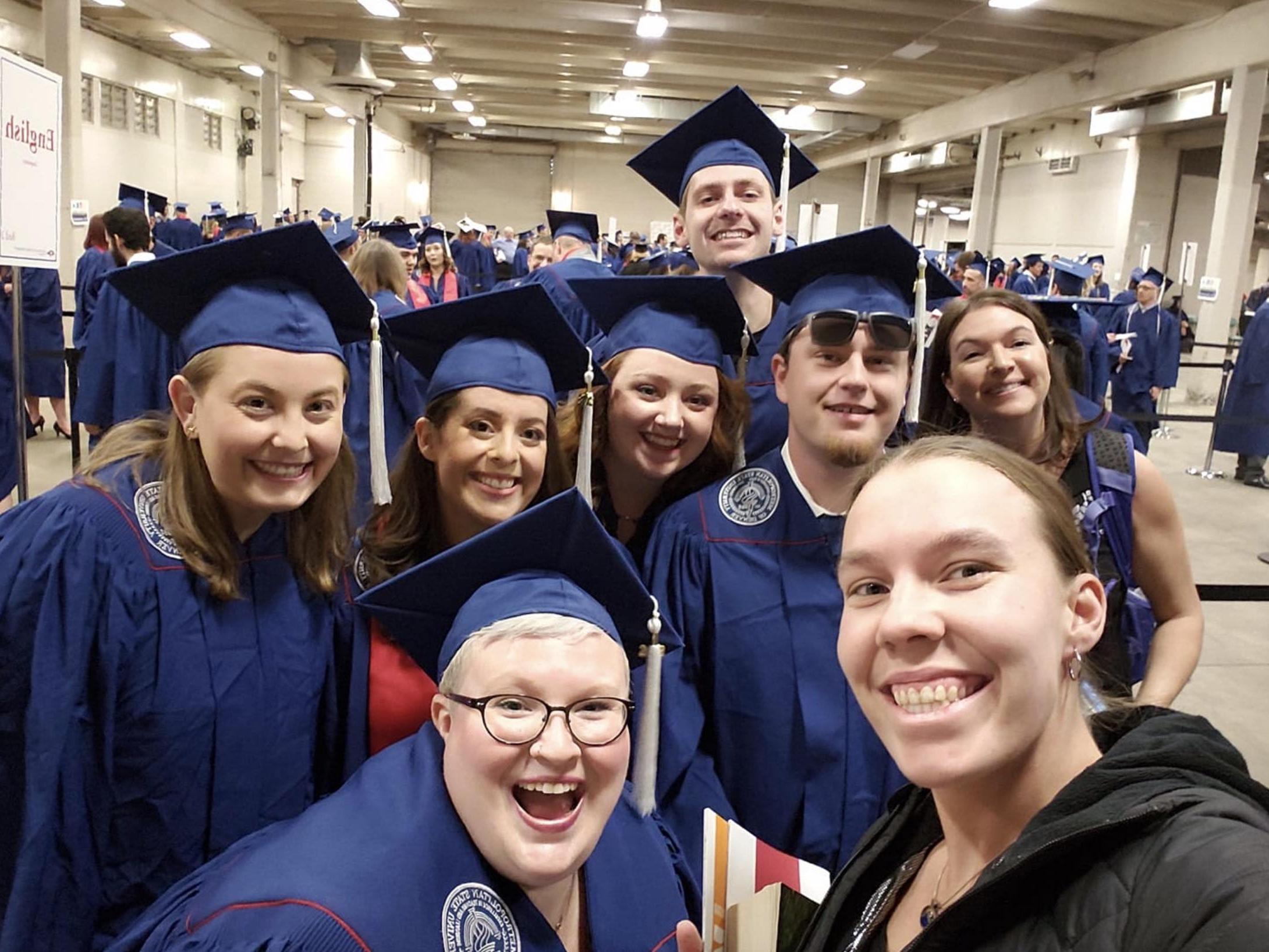 MSU Denver Graduates posing in a selfie at graduation