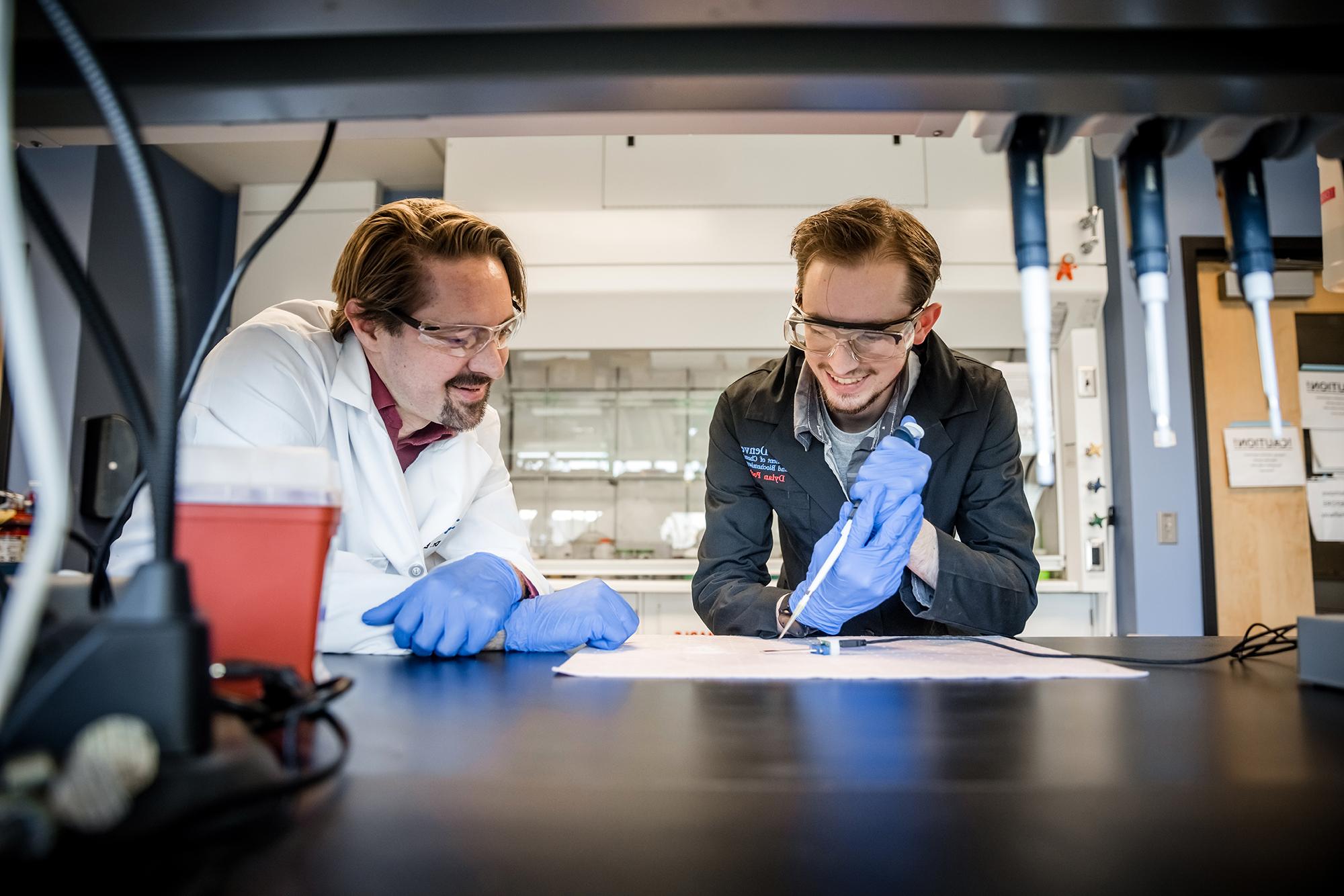 Faculty and student in a chemistry lab