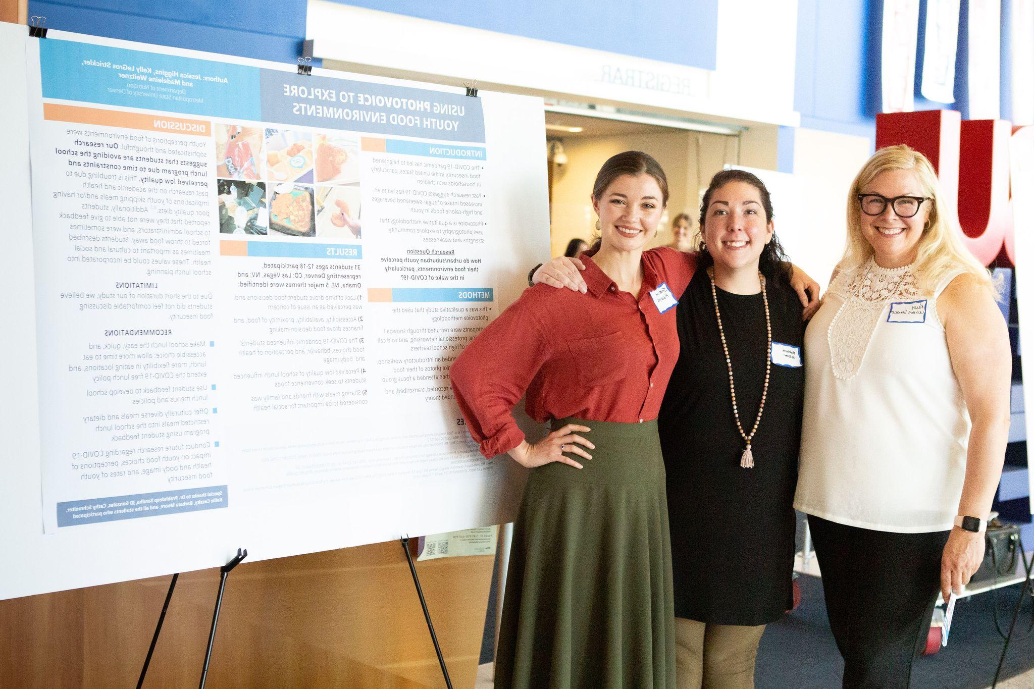 Students and faculty at a conference