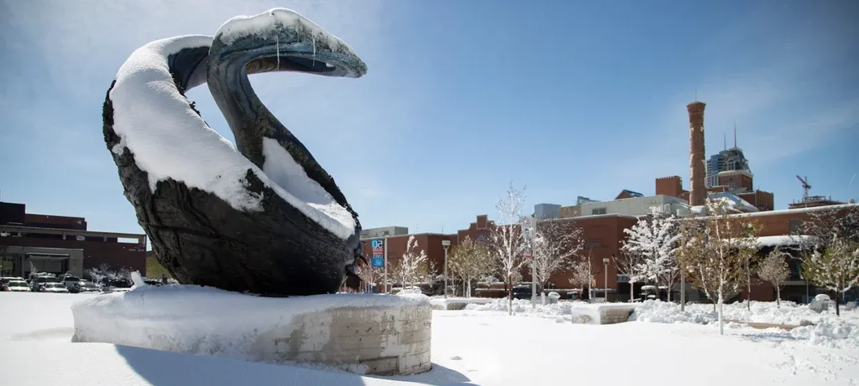 The One World One Water sculpture covered in snow