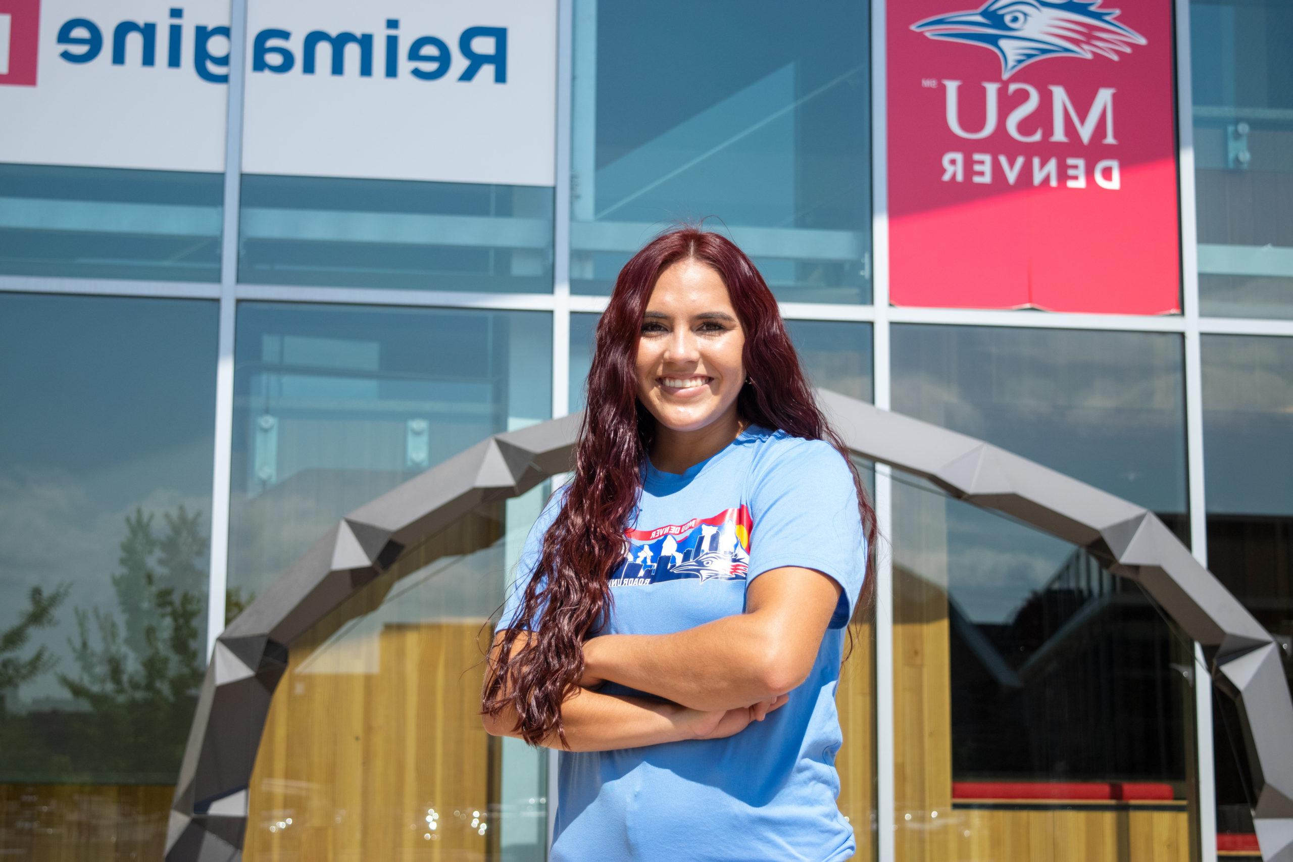 Arianna Valdez standing in front of the JSSB.