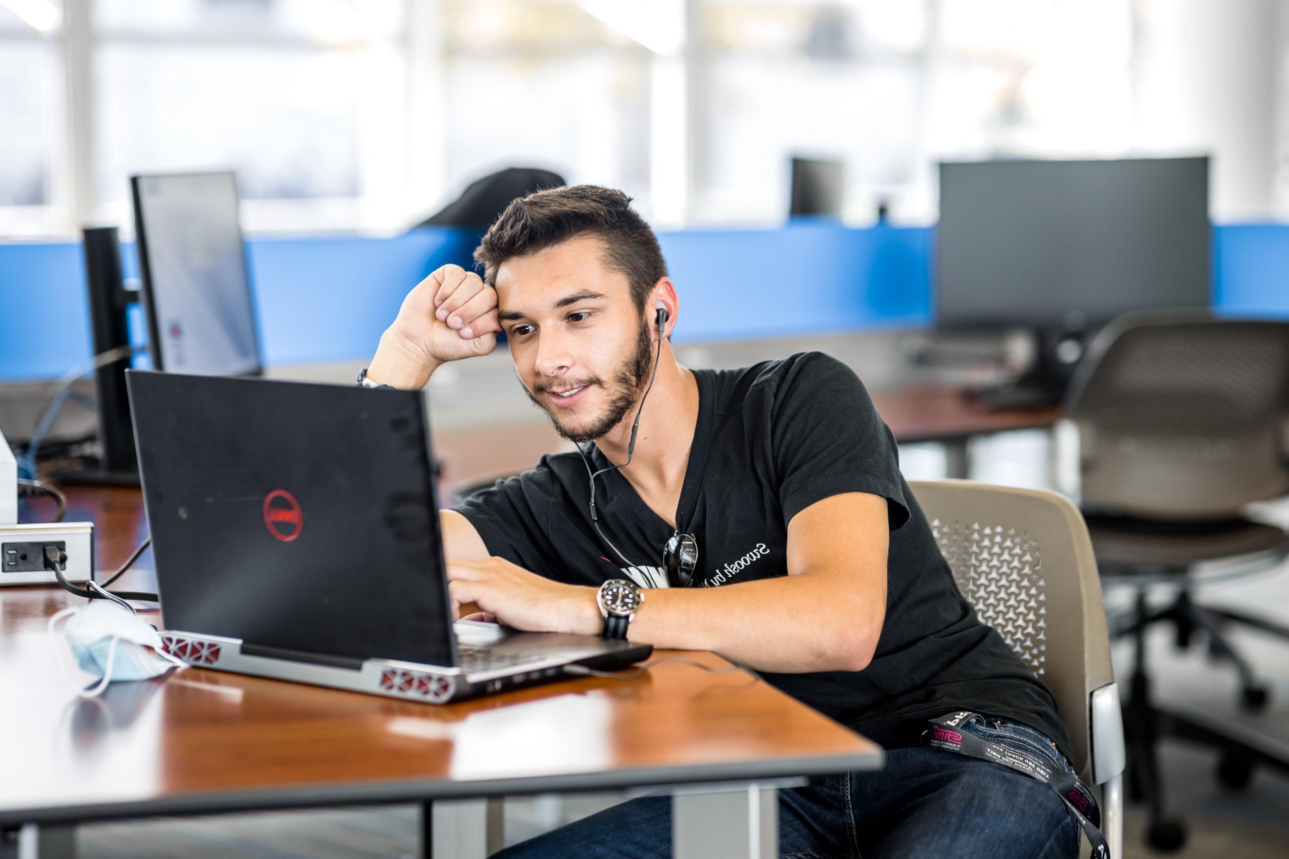 Student working on laptop