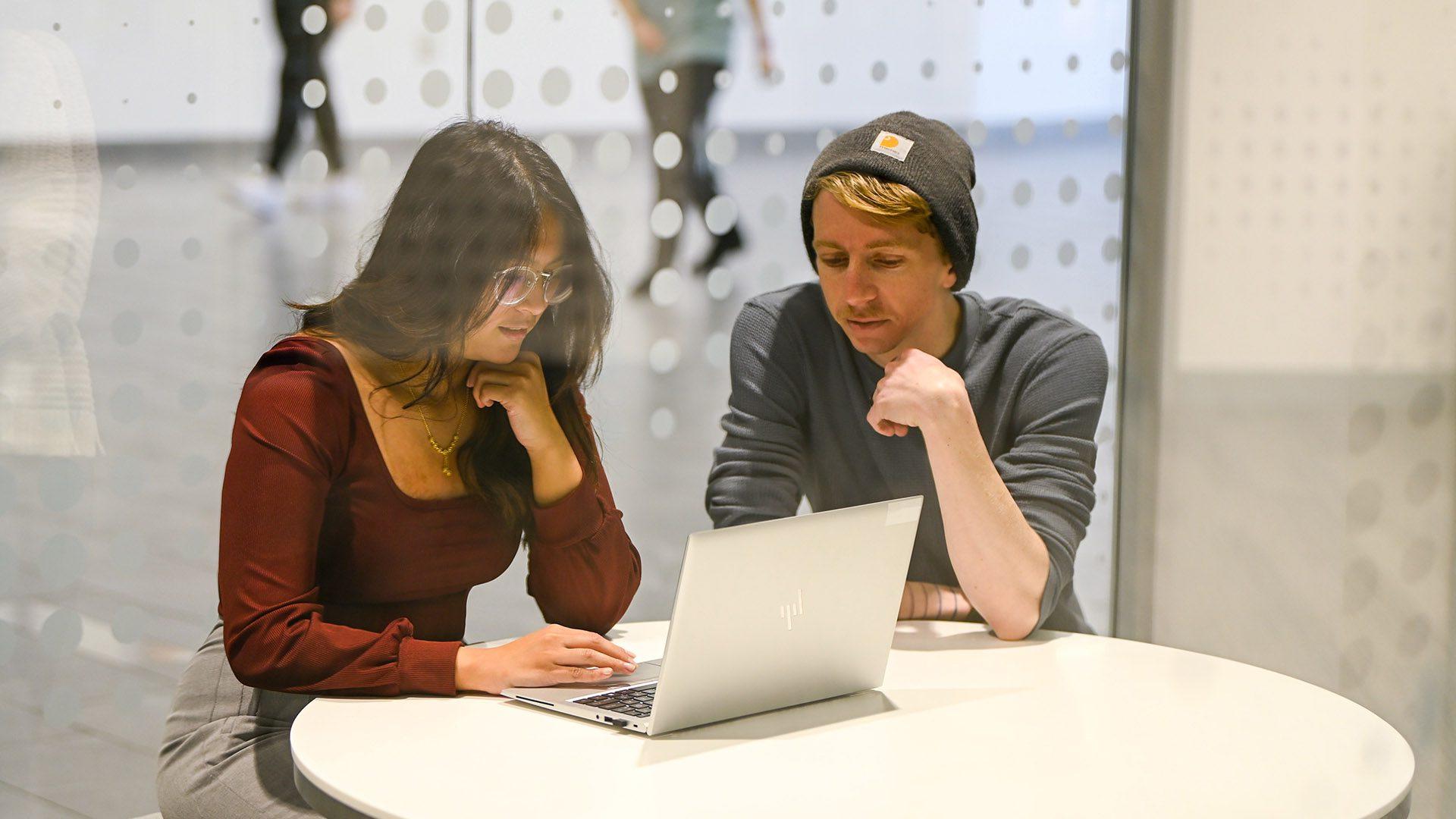 MSU Denver student Soren Singpiel, left, works with alumna Ashley Danielle Aguilar at Lockheed Martin. Photo courtesy of Lockheed Martin.