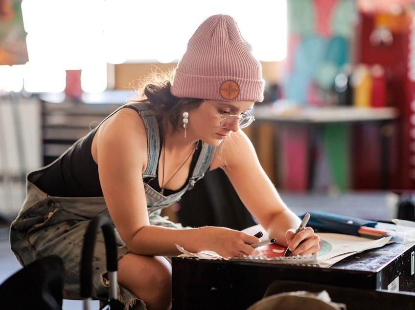 MSU Denver student, Katelin Knudsen, works on a project in Painting and New Contexts class on May 3, 2023. Photo by Alyson McClaran