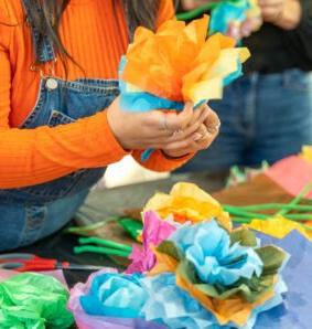 MSU Denver presents a Dios de los Muertos celabration at St. Cajetan's church with face painting, sugar skull painting, dancing, and personal alters