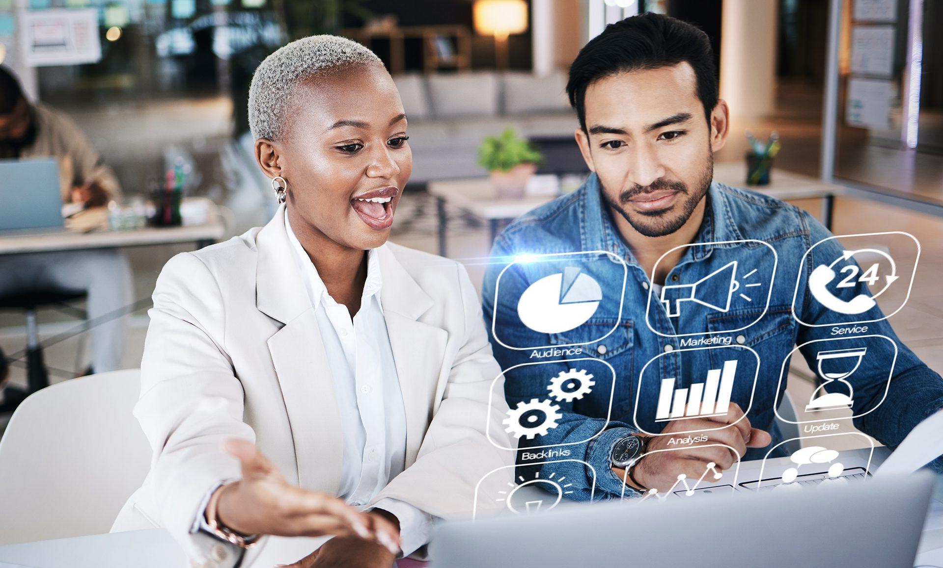 Two people working on a presentation